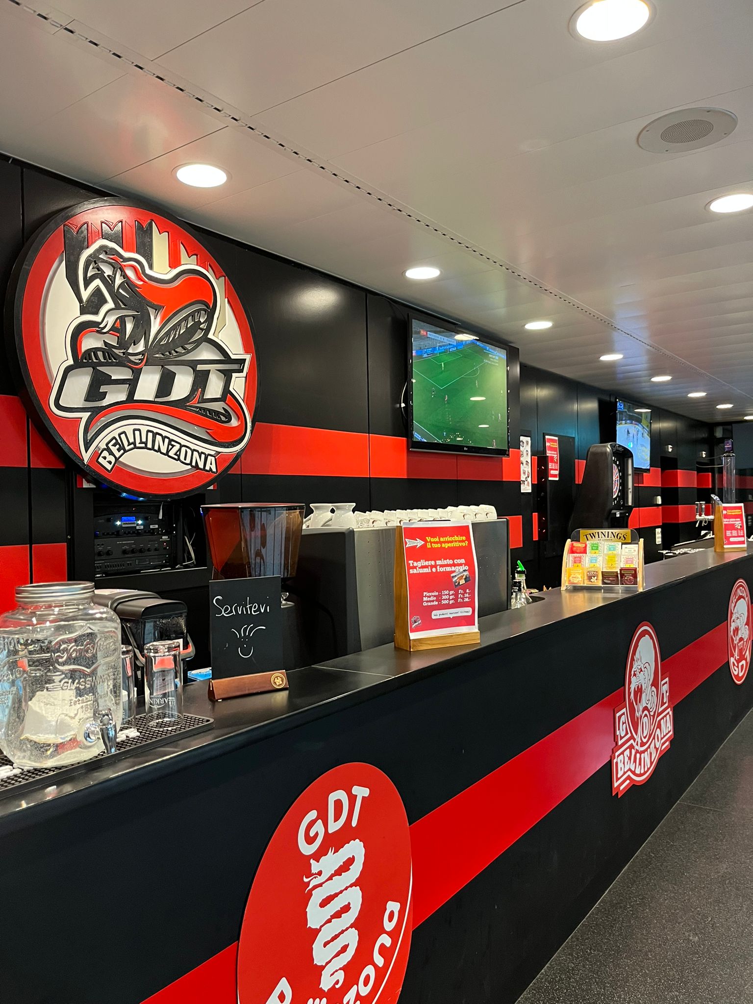 a man is skating on an ice rink